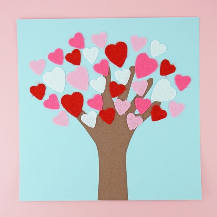This Valentine's Day tree craft is a classic Valentine's Day craft Mom's will love saving for a keepsake. Fun Valentine's Day kids craft.