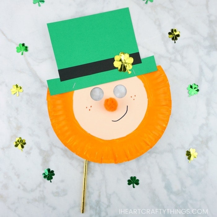 Here's a fun and easy way to create a leprechaun mask out of a paper plate. Simple St. Patrick's Day craft for preschoolers and kids.