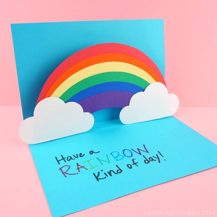 Easy pop up rainbow card for kids and adults to make. Free template and step by step instructions for pop up card making idea.
