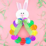 This colorful paper plate Easter Egg Wreath is a simple and easy Easter Craft idea for kids of all ages to make. Cute Easter decoration for home.