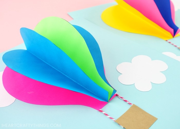 Use our free template to create this gorgeous paper hot air balloon craft. Fun 3D paper craft and summer craft for preschoolers and kids of all ages.