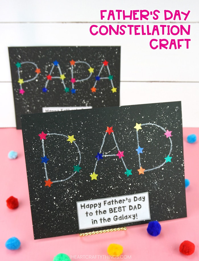 vertical image of Father's Day constellation craft on pink table with white shiplap background. DAD constellation is front and in focus and PAPA constellation is blurry in background. 