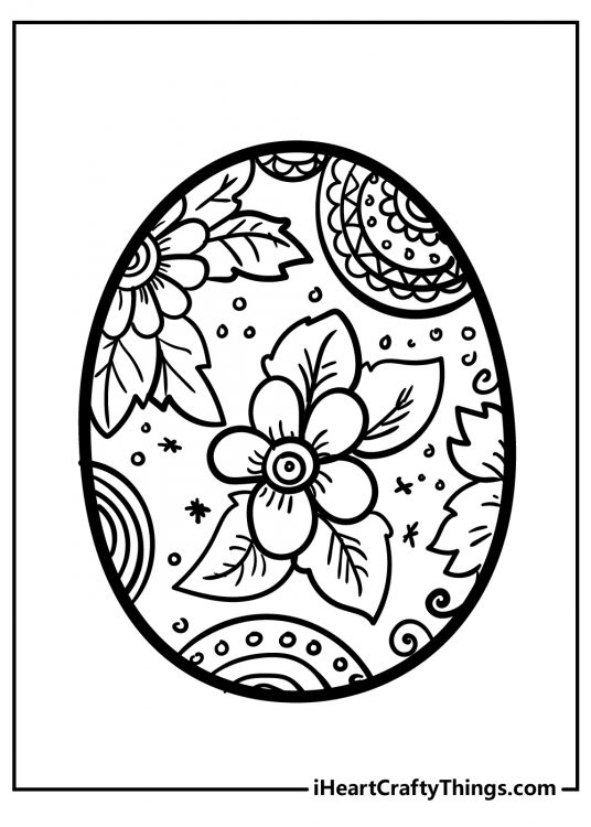 Detailed picture of an Easter Egg decorated with mandalas and flowers with leaves