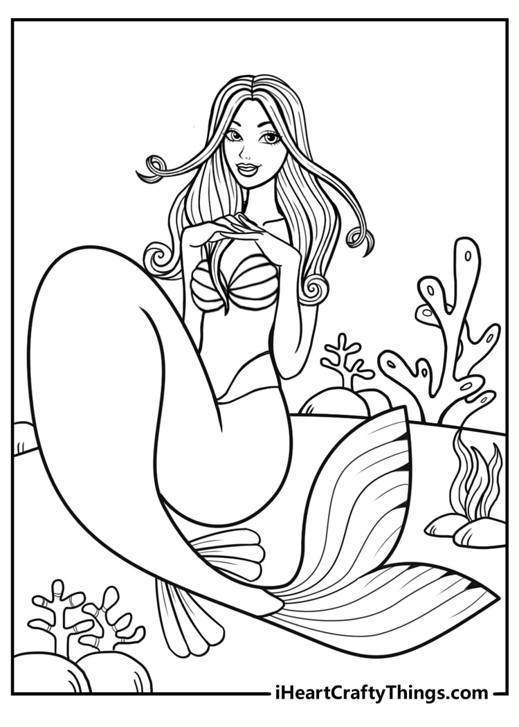 Free printable of a beautiful mermaid with an extra set of small fins holding hands folded together