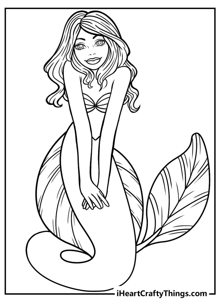 Printable sheet featuring sweet mermaid with a unique tail with a striped pattern on the sides