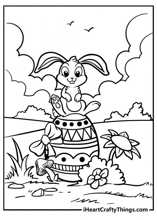Easter Bunny sitting on a huge Easter egg decorated with a bow surrounded by nature free printable image for kids