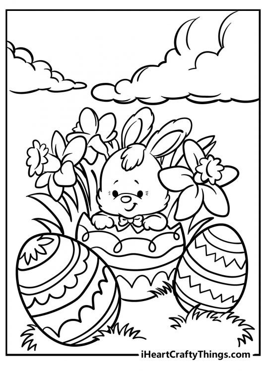 Printable page for kids featuring sweet scene of a little bunny hatching from an Easter egg surrounded by daffodils