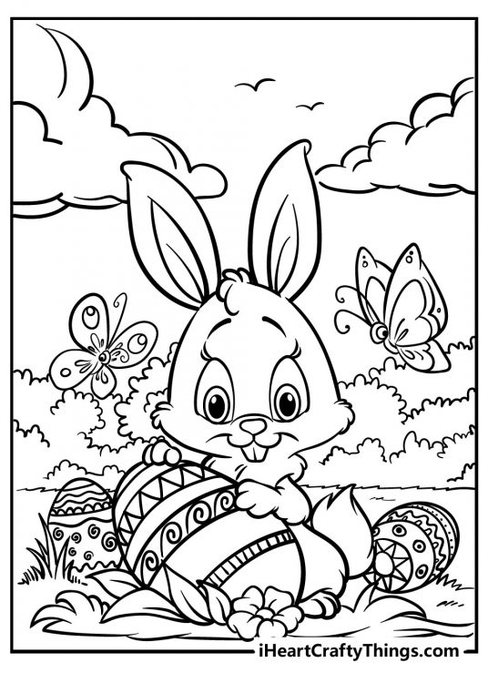 Coloring card of an Easter bunny in the centre with flowers and butterflies dotted around along with the painted eggs