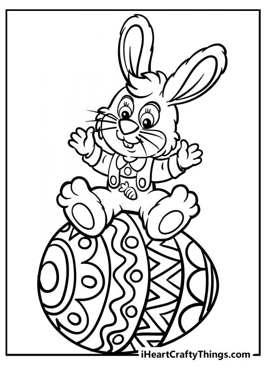 Easter bunny sitting on a big Easter egg with arms spread widely free page to print and color