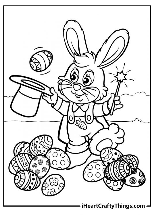 Free printable image of a magician Easter Bunny pulling eggs out of a hat with huge pile of eggs on the ground