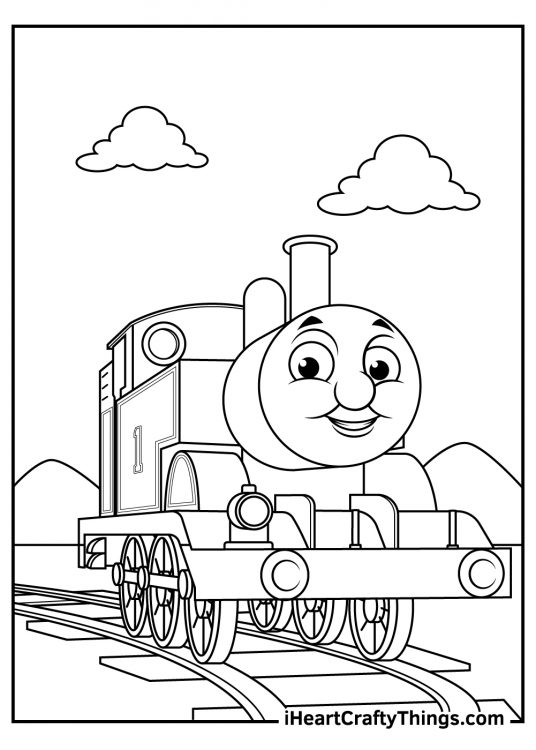 Free coloring printable depicting Thomas the Train with mountains and clouds behind him