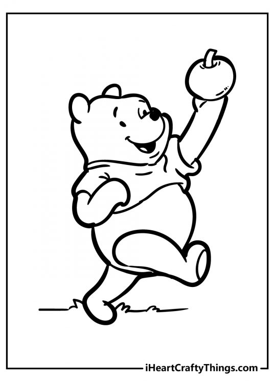 Winnie the Pooh coloring sheet for kids presenting him holding a tasty apple high in the air