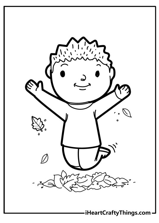 Fall printable of a little boy jumping into a pile of leaves with his arms raised and his legs up in the air