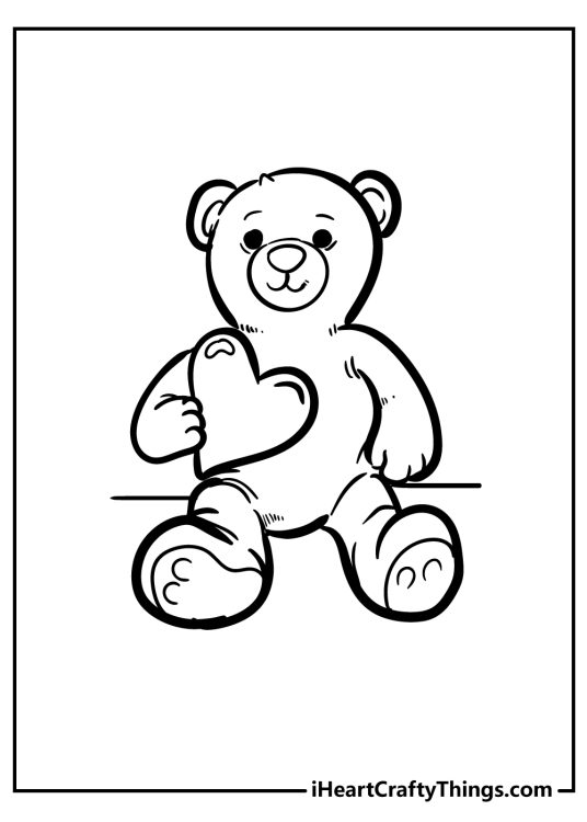 Free Teddy Bear printable featuring cute Teddy Bear with a big heart in his right hand