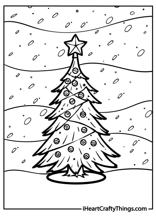 Christmas-themed printable showing slender and triangular-shaped decorated Christmas tree in a heavy snow