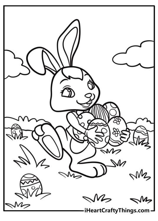 Cute easter bunny hiding eggs in the grass