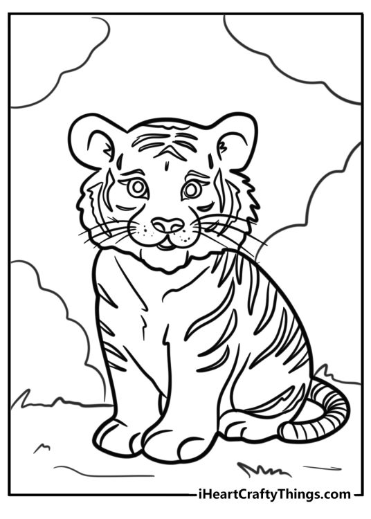 Coloring image of a young curiuos-looking tiger sitting outdoors on a grassy terrain