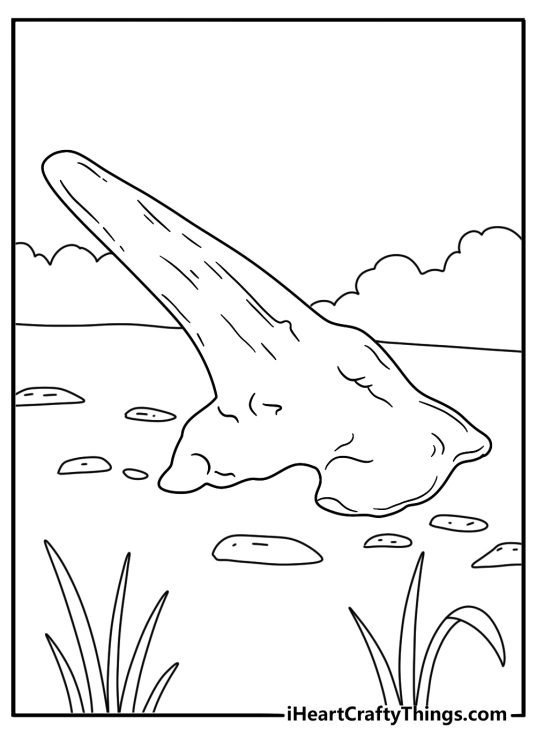 A fossil hunter brushes dirt from a triceratops horn in this printable