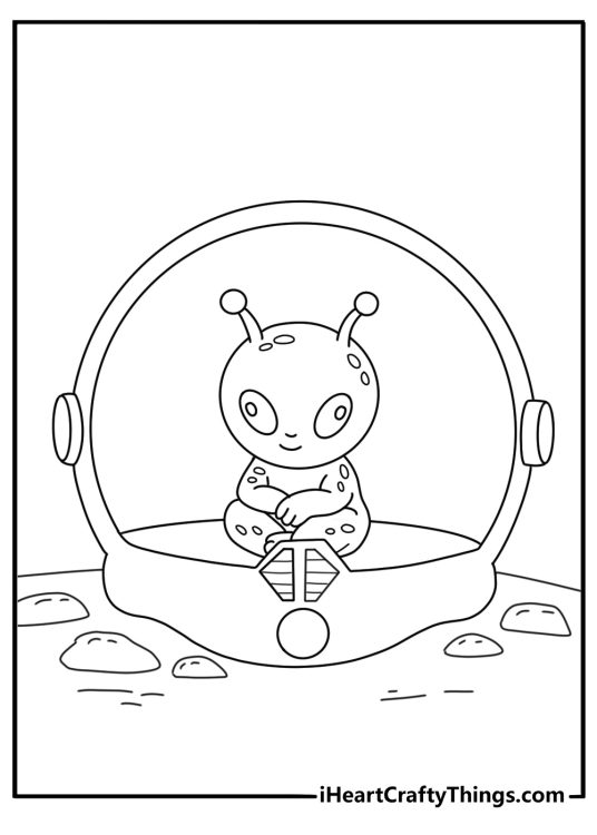 A tiny alien sits inside a clear space helmet in this cute printable