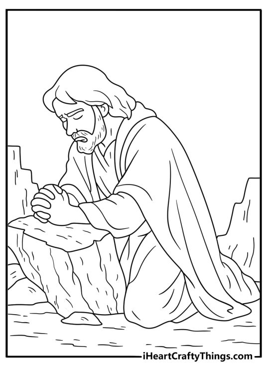 Free Jesus printable of Jesus praying alone beside desert stones