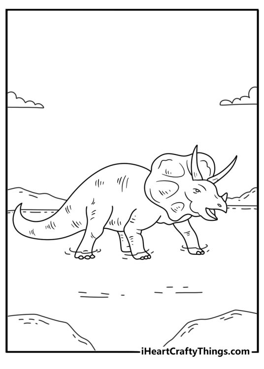 Free dinosaur printable with a triceratops walking through shallow water