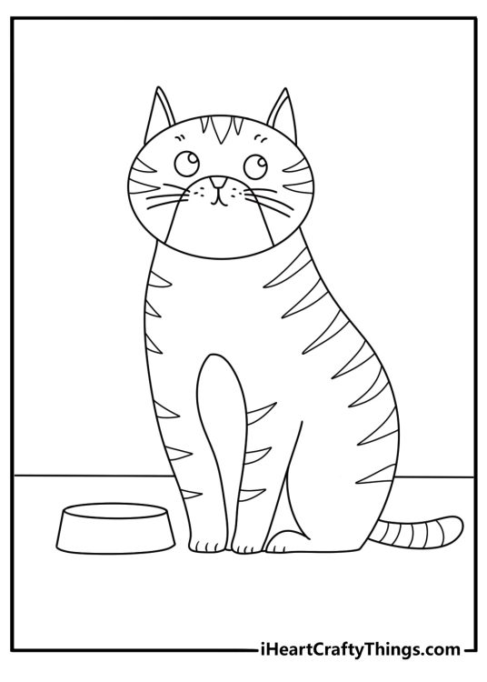 Free kitten printable featuring a curious cat beside a food bowl