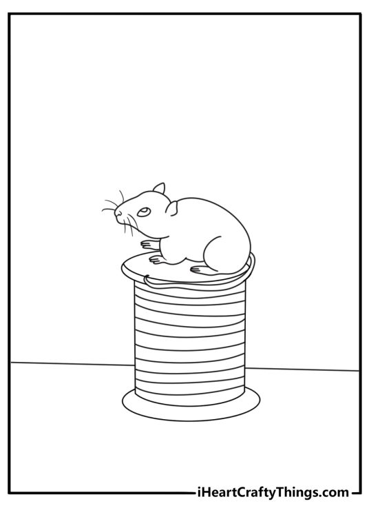 Free printable mouse coloring sheet with a mouse beside a spool of thread