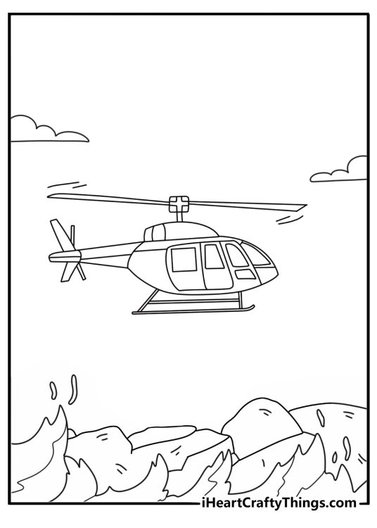 Free printable of a coast guard helicopter above ocean waves and rocks