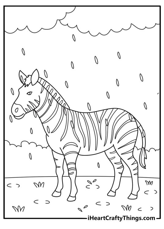 Free safari printable showing a zebra under heavy rain clouds