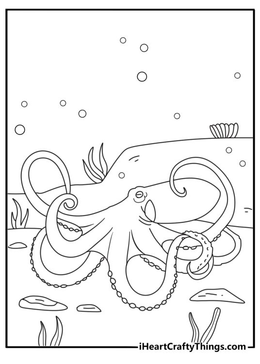 Giant Pacific octopus spreading arms over rocky seabed printable coloring sheet for adults