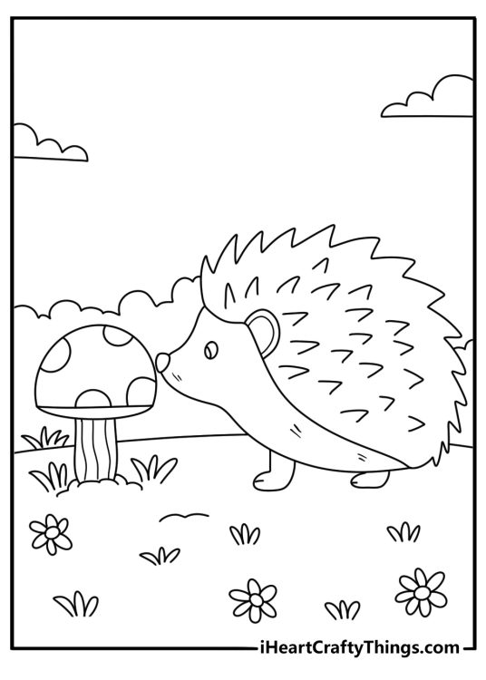 Hedgehog sniffing a mushroom in the forest printable coloring sheet for kids