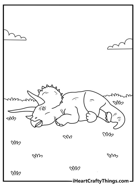 Jurassic World dinosaur coloring pages scene with Triceratops resting in an open field