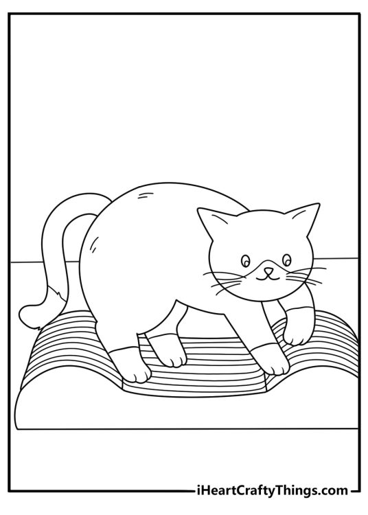 Printable kitten sheet featuring a young cat beside a scratching pad