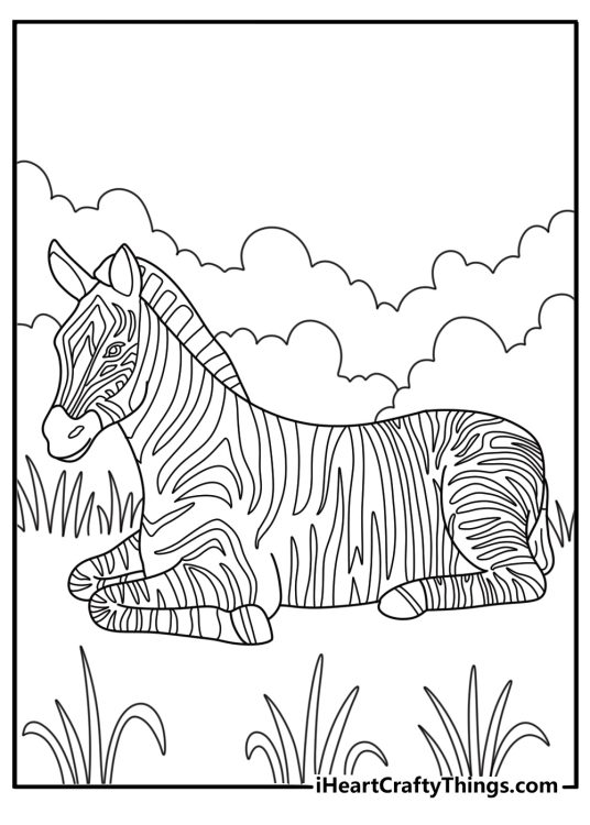 Tall reeds surround a resting zebra in this free printable