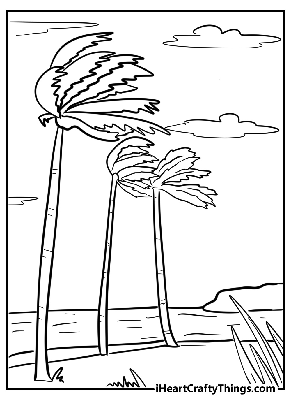 A palm tree swaying in the strong wind
