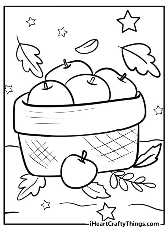 Coloring picture for pre-schoolers featuring a basket full of apples surrounded by fall leaves and stars