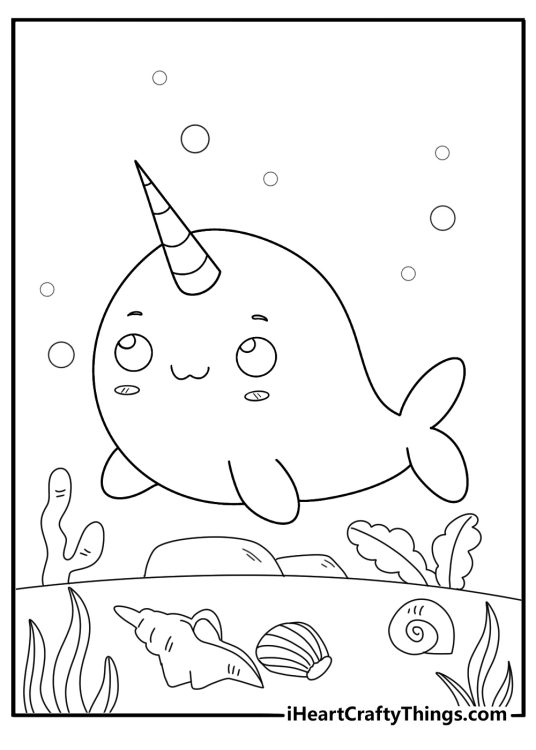 kawaii narwhal with seashells around it printable coloring sheet