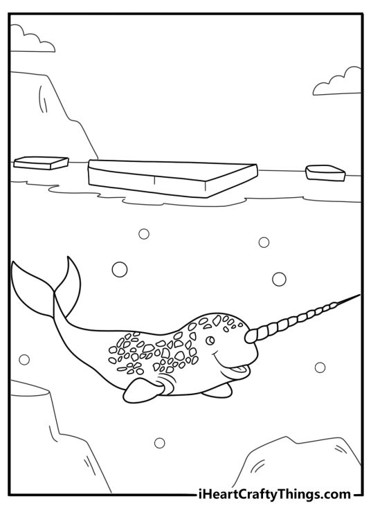 narwhal swimming under floating ice coloring page for kids