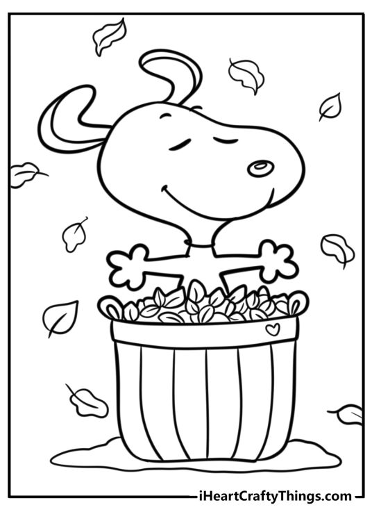 Fall-themed coloring pdf depicting happy-lookimng character Snoopy sitting in a pot full of leaves