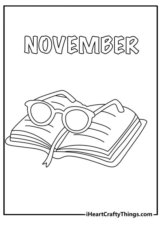 the word november appearsabove a pair of reading glasses and an open book