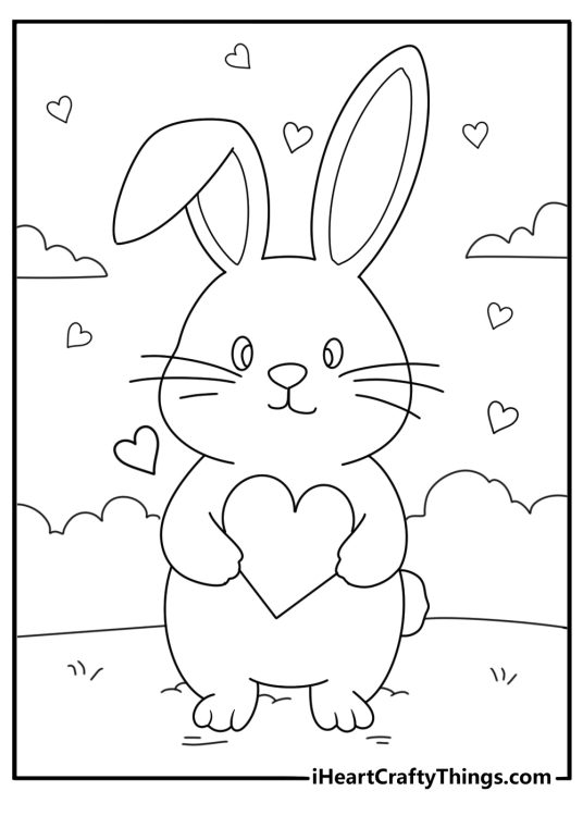 Coloring sheet for children featuring adorable rabbit standing on his hind legs and holding big heart