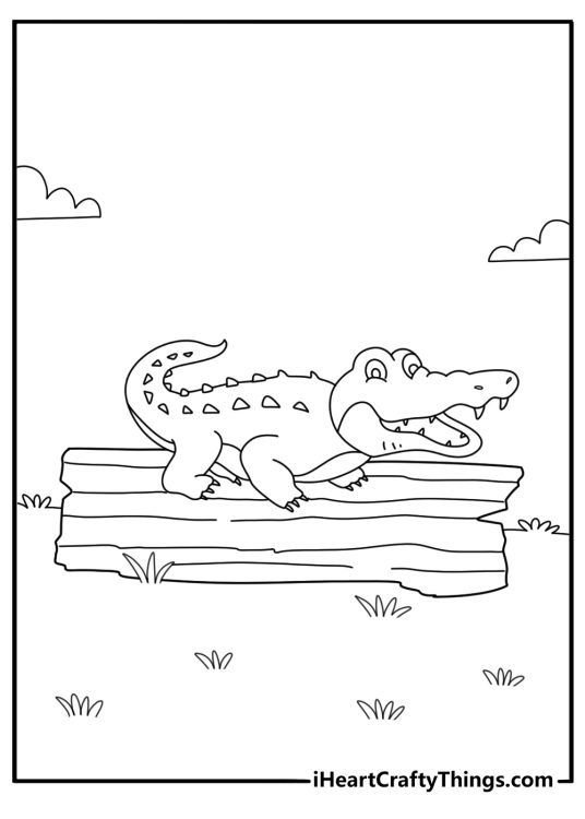 Cute crocodile coloring pages with a small reptile sitting on a log