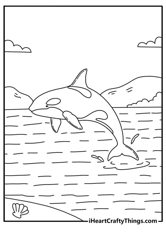 Free Killer Whale coloring pages coloring page with an orca near rocky islands