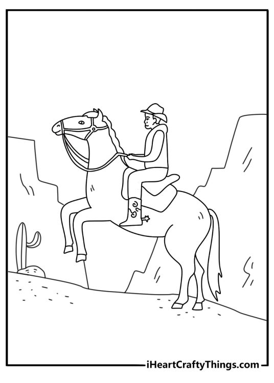 Free printable of a charro riding a horse through desert hills