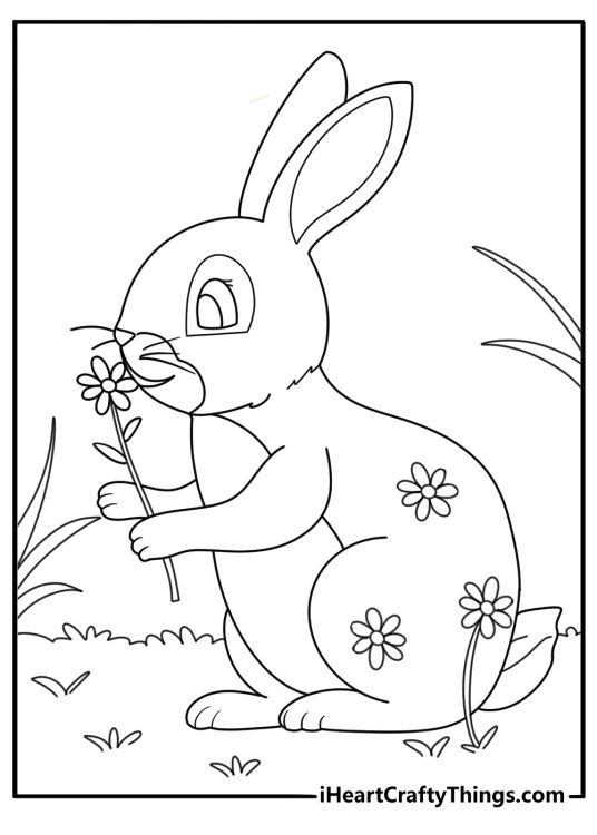Image to color of a little rabbit with beautiful flowers and leaves tucked all over his body