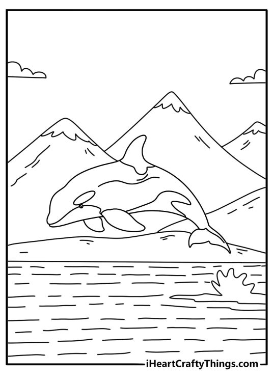 Killer Whale coloring page with an orca breaching beside snowy mountains