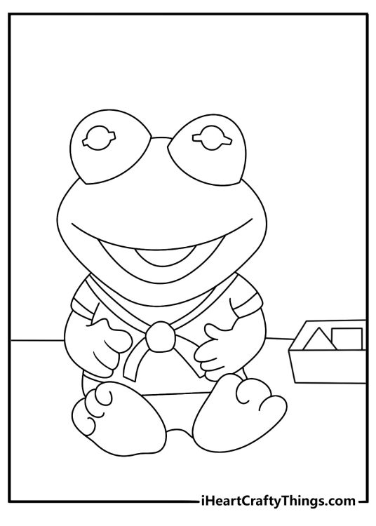 Muppet Babies coloring page showing baby Kermit beside a nursery toy box