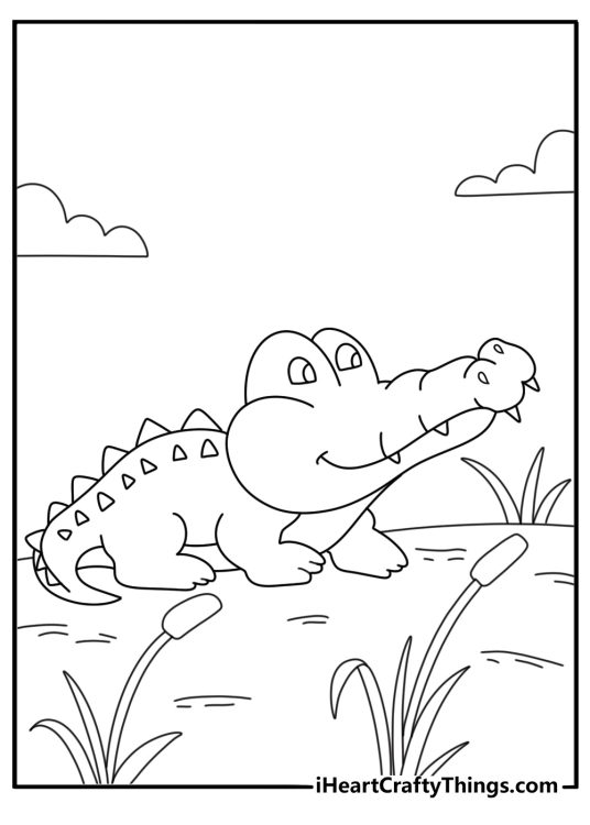 Preschool crocodile coloring pages with a small crocodile near cattails