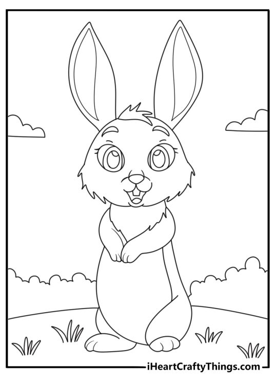 Printable coloring pdf of a super excited rabbit standing on the grass on her hind legs