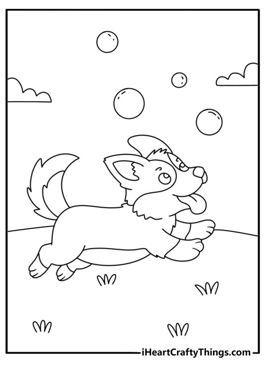 Printable puppy sheet featuring a pup chasing soap bubbles outdoors